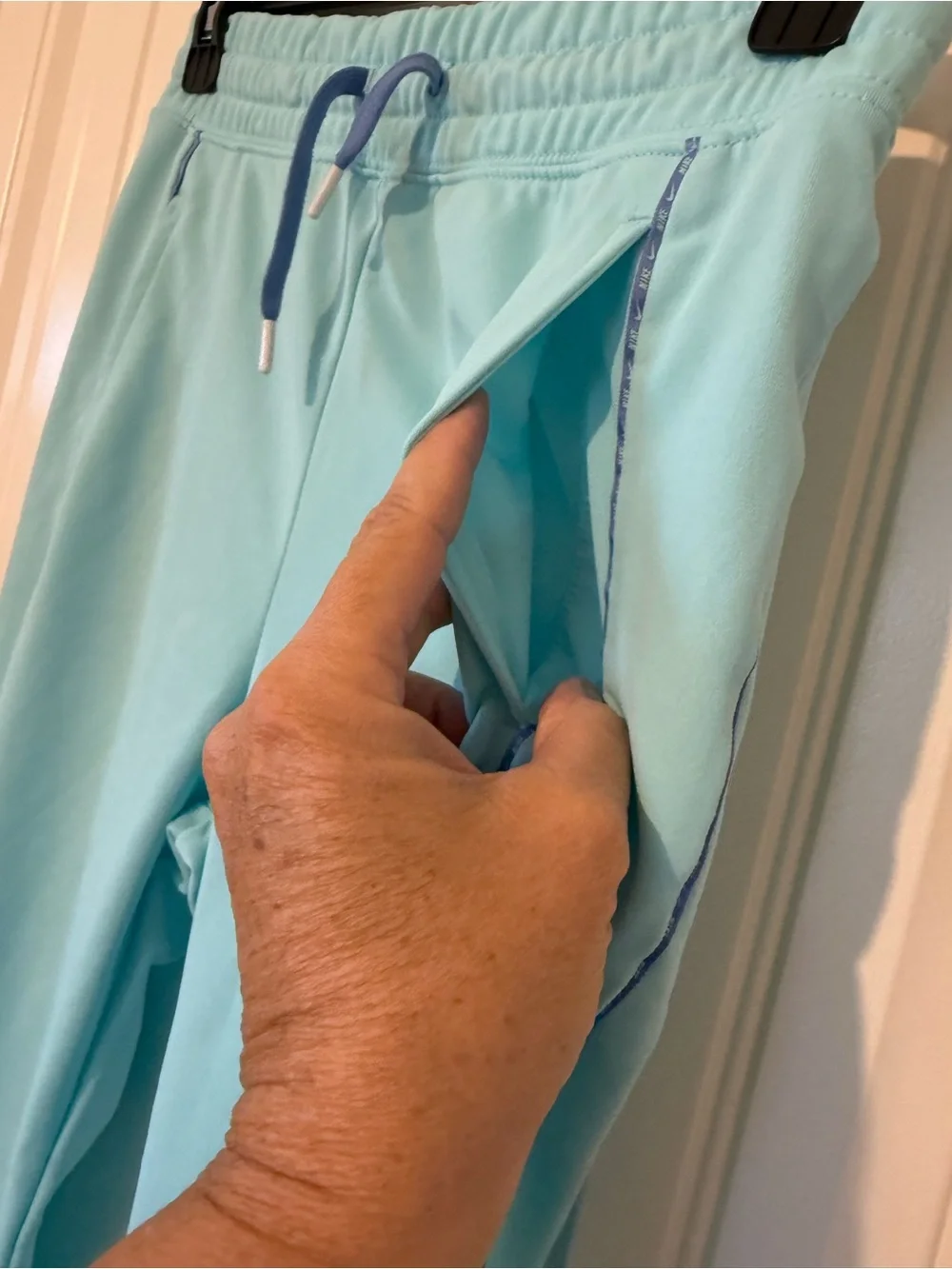 Nike Kids light teal blue Joggers with Blue Piping